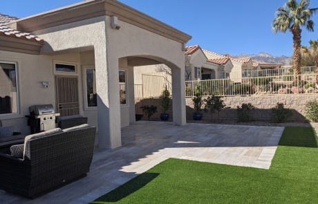 covered-patio-with-stone-paver-deck.jpg Covered patio with outdoor seating on a custom stone paver deck.